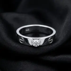 Cartier's, LOVE solitaire, brilliant-cut stone