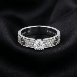 Cartier's, LOVE solitaire, brilliant-cut stone, paved