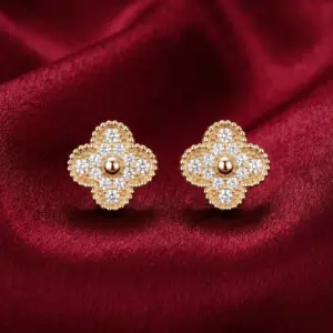 Van Cleef & Arpels, Vintage Alhambra Sparkle earrings Gold Filled
